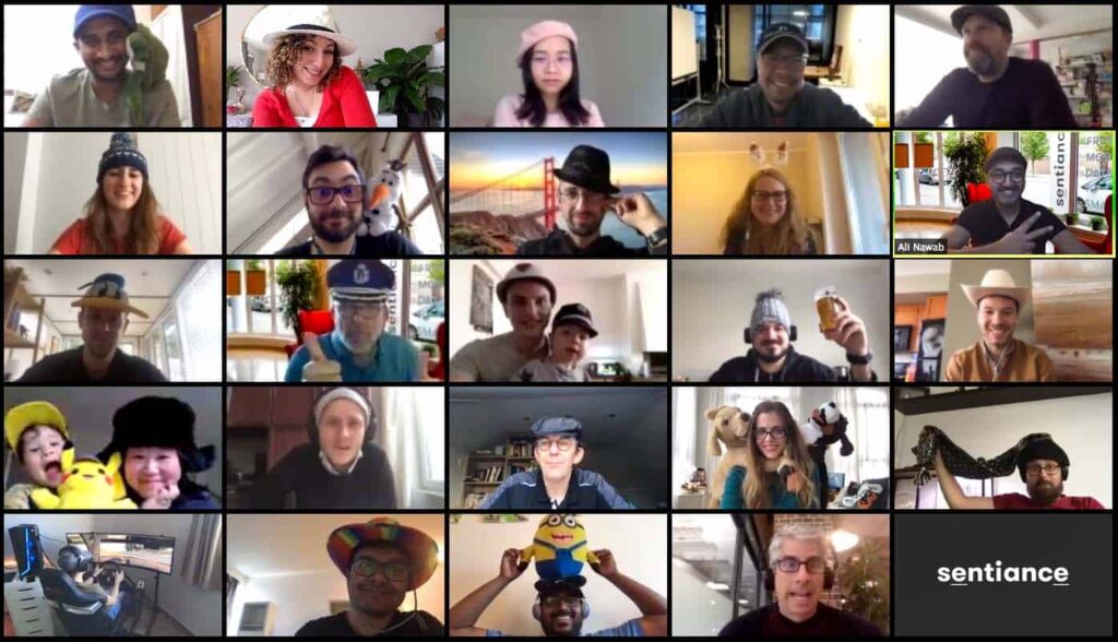 Sentiance work from home - hat theme team photo